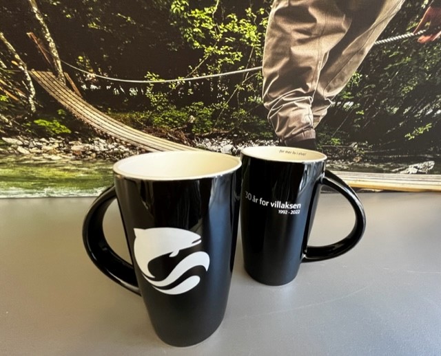 Kaffekrus med logoen til Norske Lakseelver.